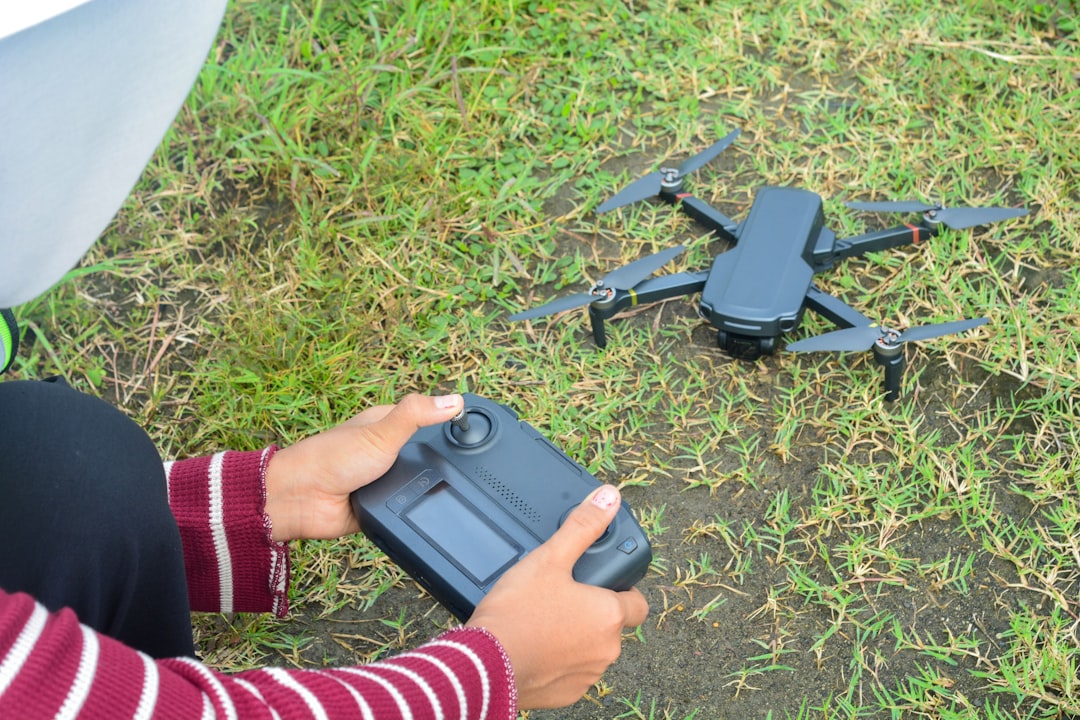 drone pilot checking map outdoors