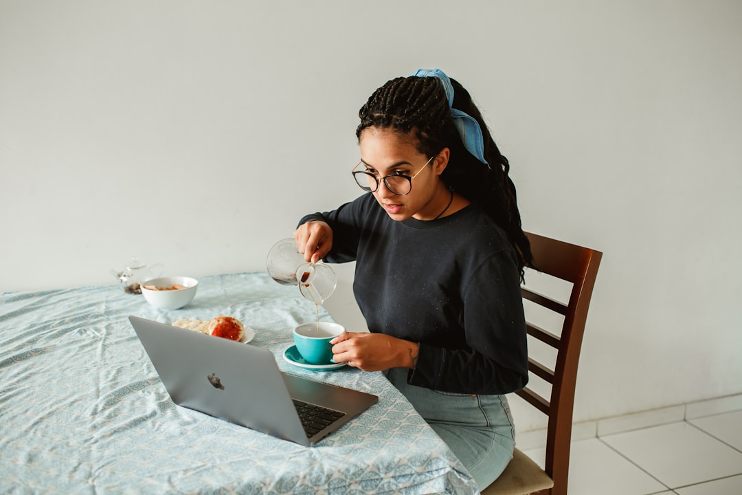 woman working with digital tools at home